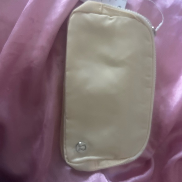lululemon athletica Handbags - Lululemon Athletica Cream Belt Bag